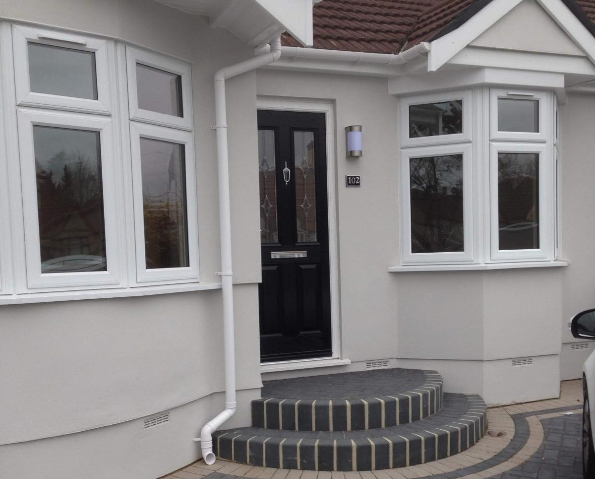 White UPVC bi-fold doors